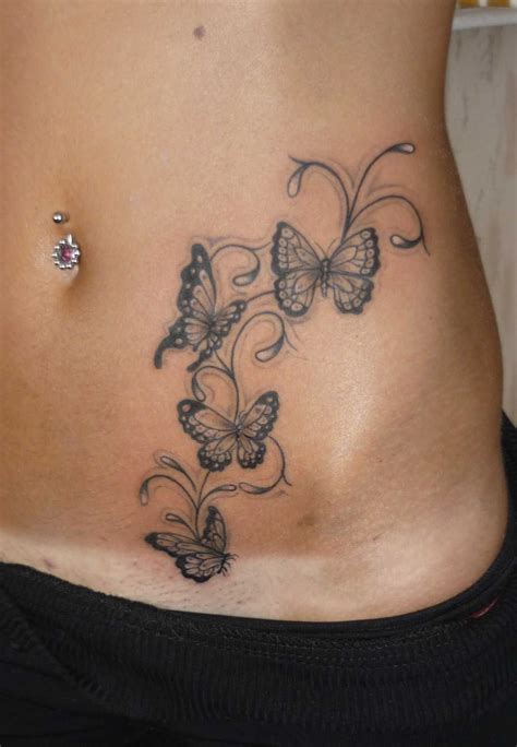 women's lower stomach tattoos|side stomach tattoos for females.